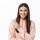 portrait-attractive-young-millennial-woman-with-long-hair-smiling-pointing-finger-left (1)